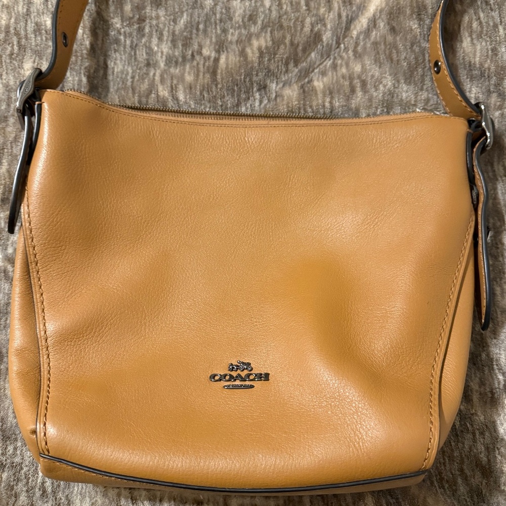 COACH tan leather crossbody hobo.. euc..